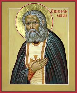 Religious icon of a bearded saint with halo, wearing ornate robes and holding a hand in prayer or blessing gesture